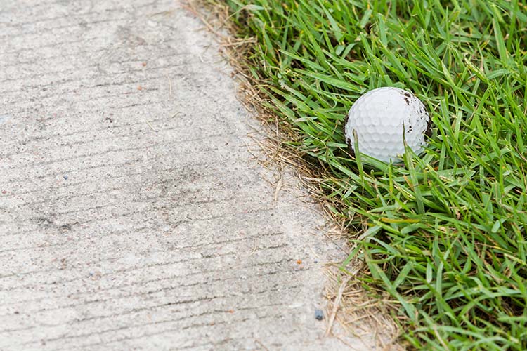 Golf Ball On Cart Path